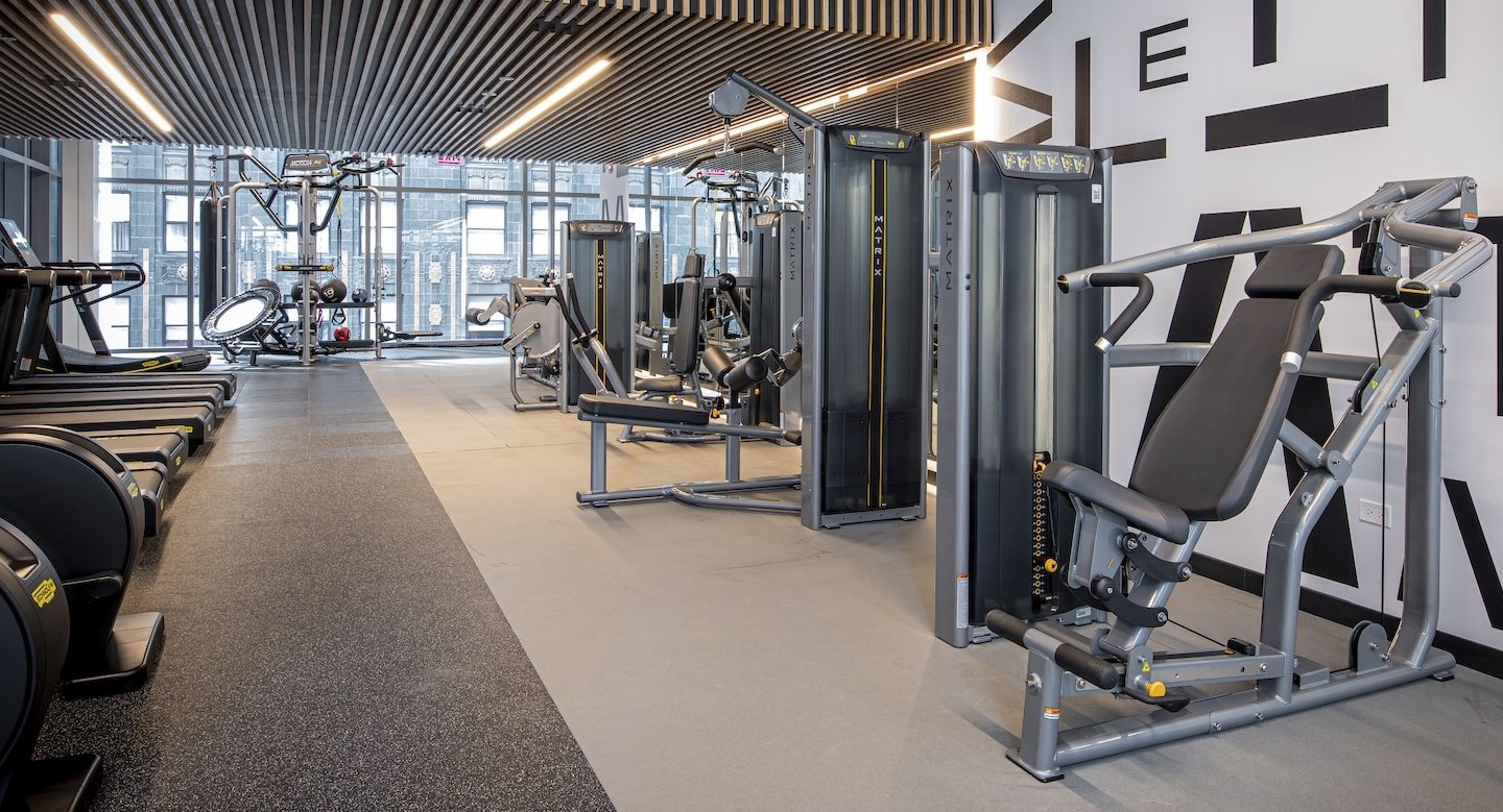 State-of-the-art fitness center with diverse workout equipment at Millie on Michigan apartments in Chicago