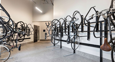 Organized bike storage room at Nevele22 in Chicago, providing secure racks for multiple bicycles