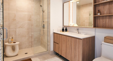 Elegant bathroom with a glass-enclosed shower, wood vanity, large mirror, and practical built-in shelving at OLD TOWN PARK THREE in Chicago