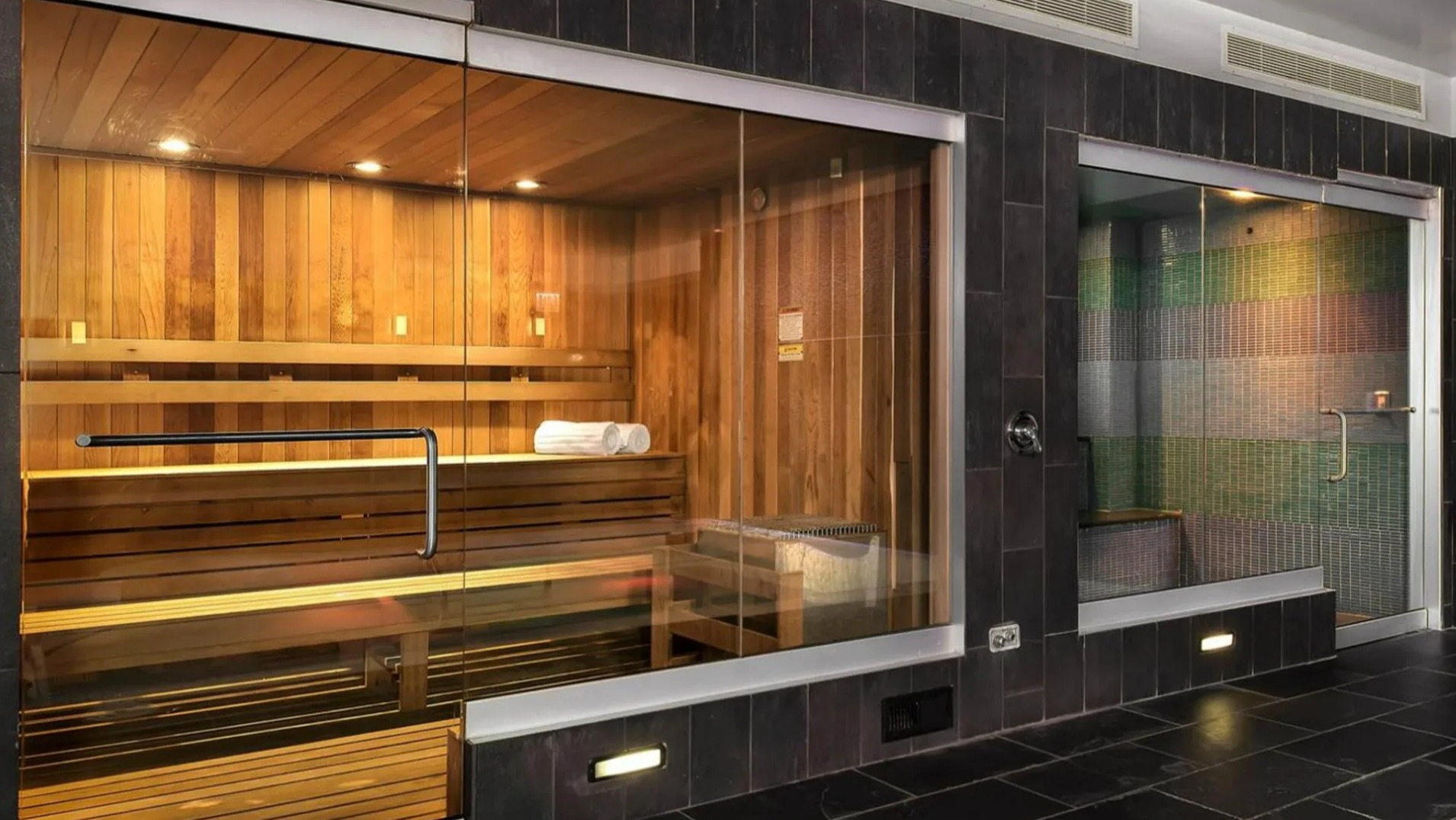 Luxurious sauna and steam room at Parc Huron in Chicago, offering residents a perfect retreat for relaxation and wellness