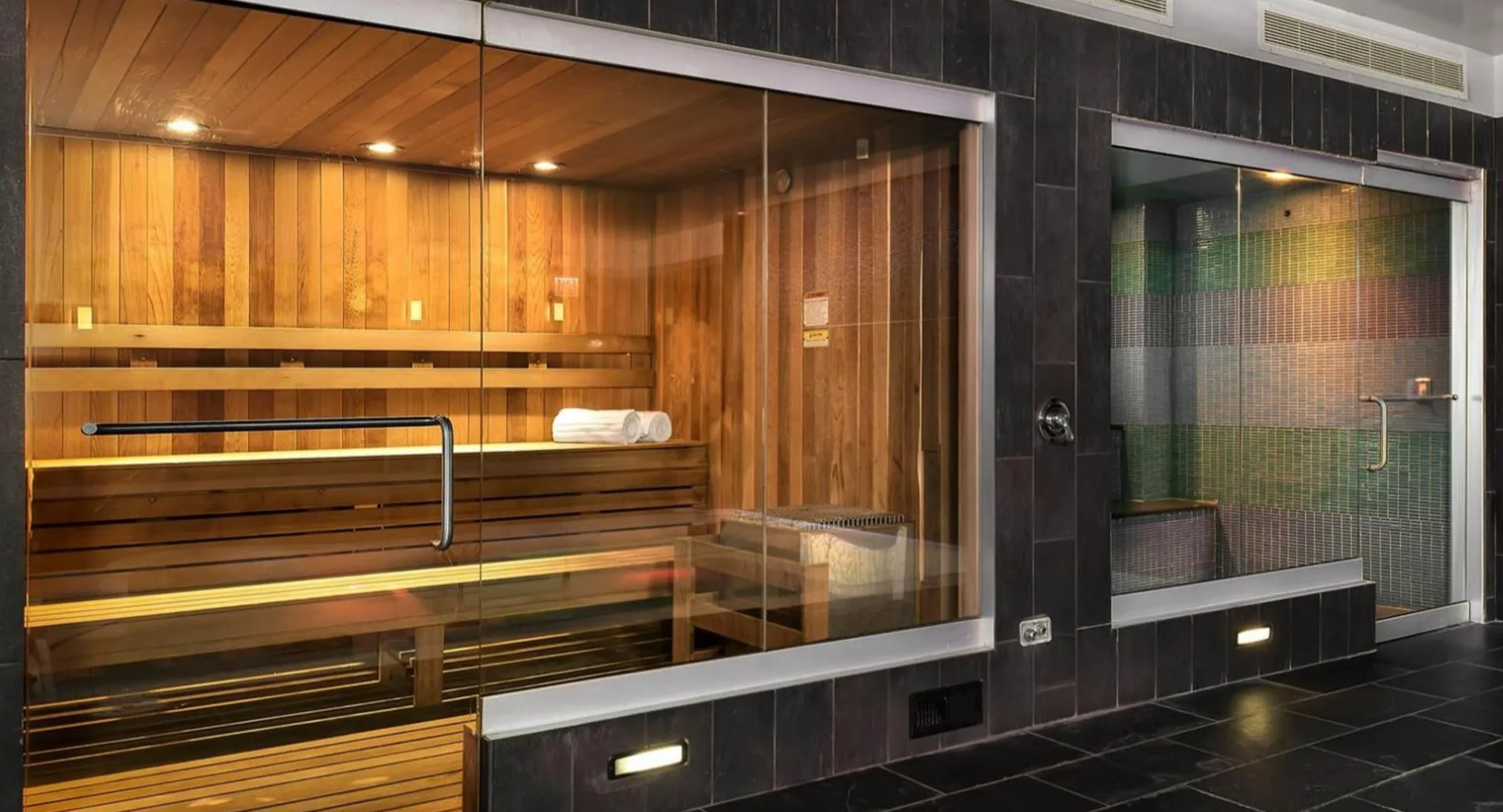 Luxurious sauna and steam room at Parc Huron in Chicago, offering residents a perfect retreat for relaxation and wellness