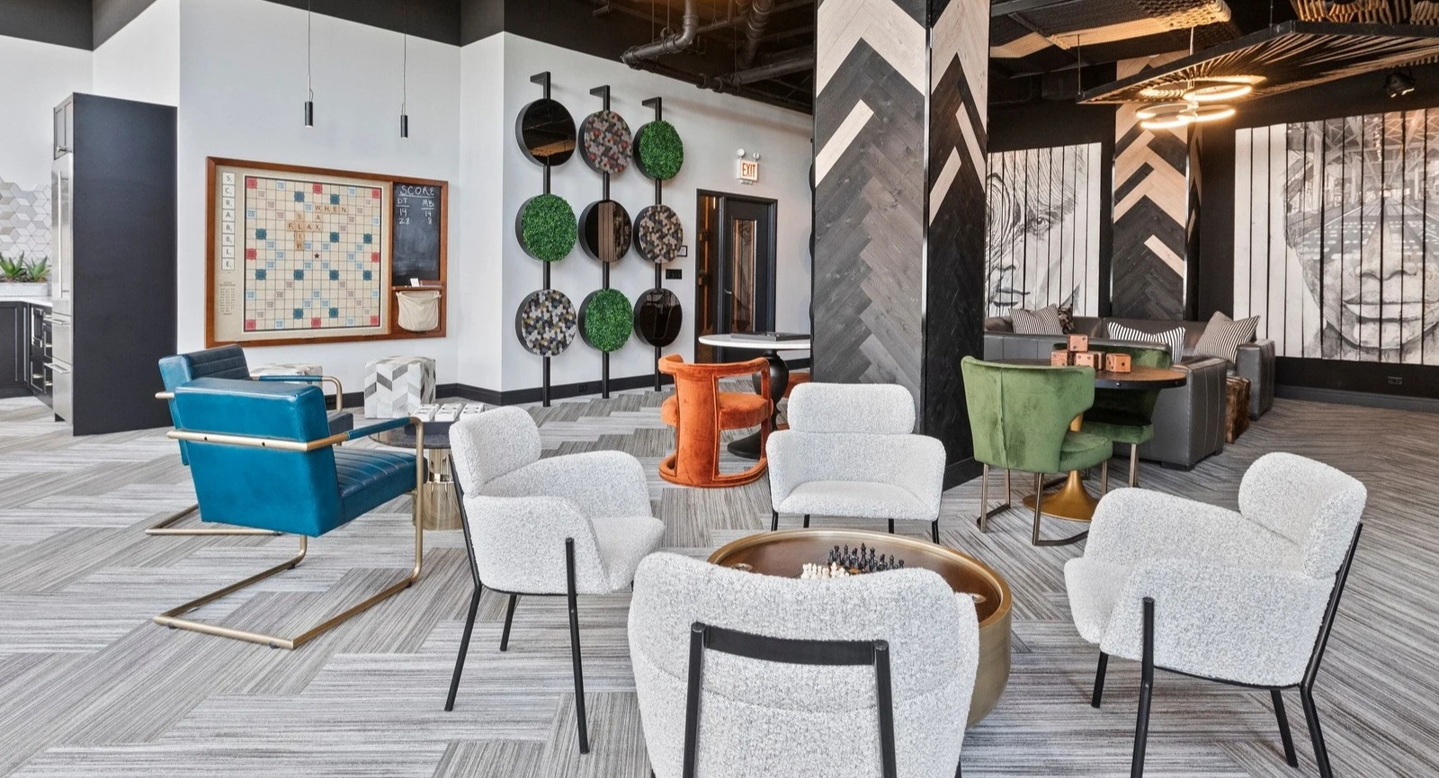 Expansive resident lounge at Park Michigan in Chicago, featuring various seating areas, board games, and an engaging atmosphere