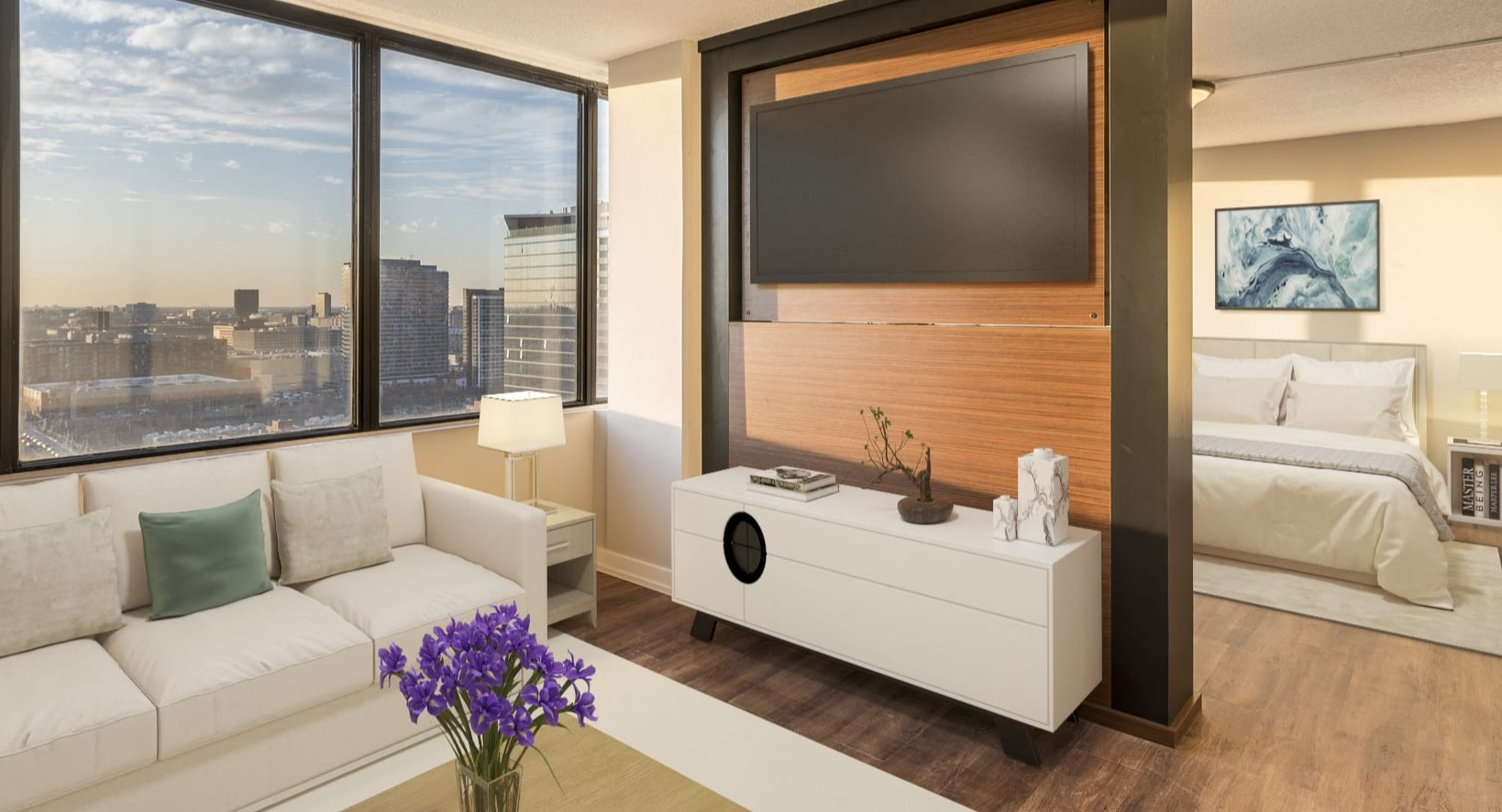 Bright studio apartment with an open layout, a living area, bedroom, and large windows offering city views at Park Michigan in Chicago