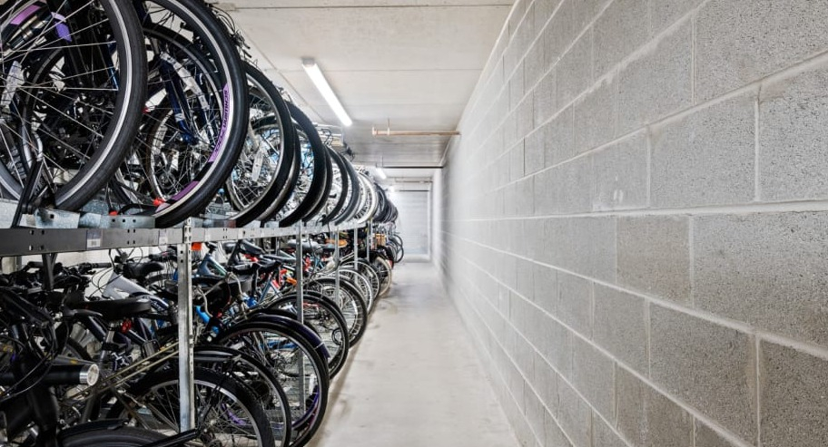 Indoor bike storage room with double-decker racks at Shoreham and Tides apartments in Chicago