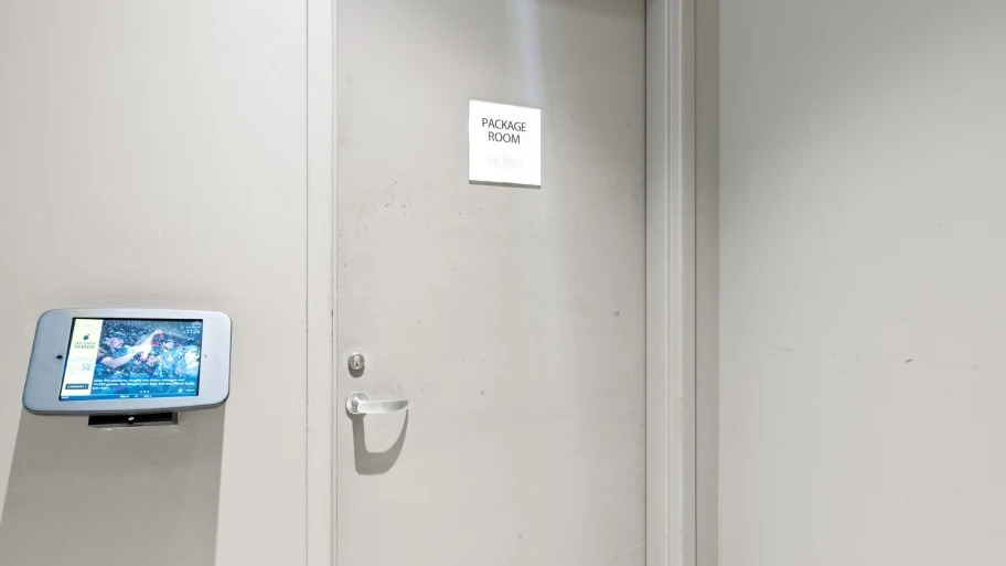 Secure package room with Luxer One access system at Shoreham and Tides apartments in Chicago