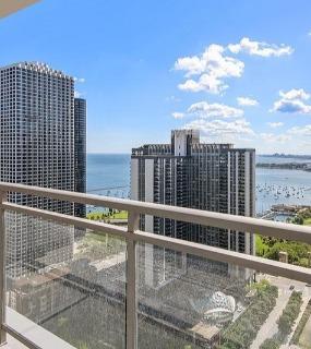 Balcony with breathtaking city and lake views at Shoreham and Tides apartments in Chicago