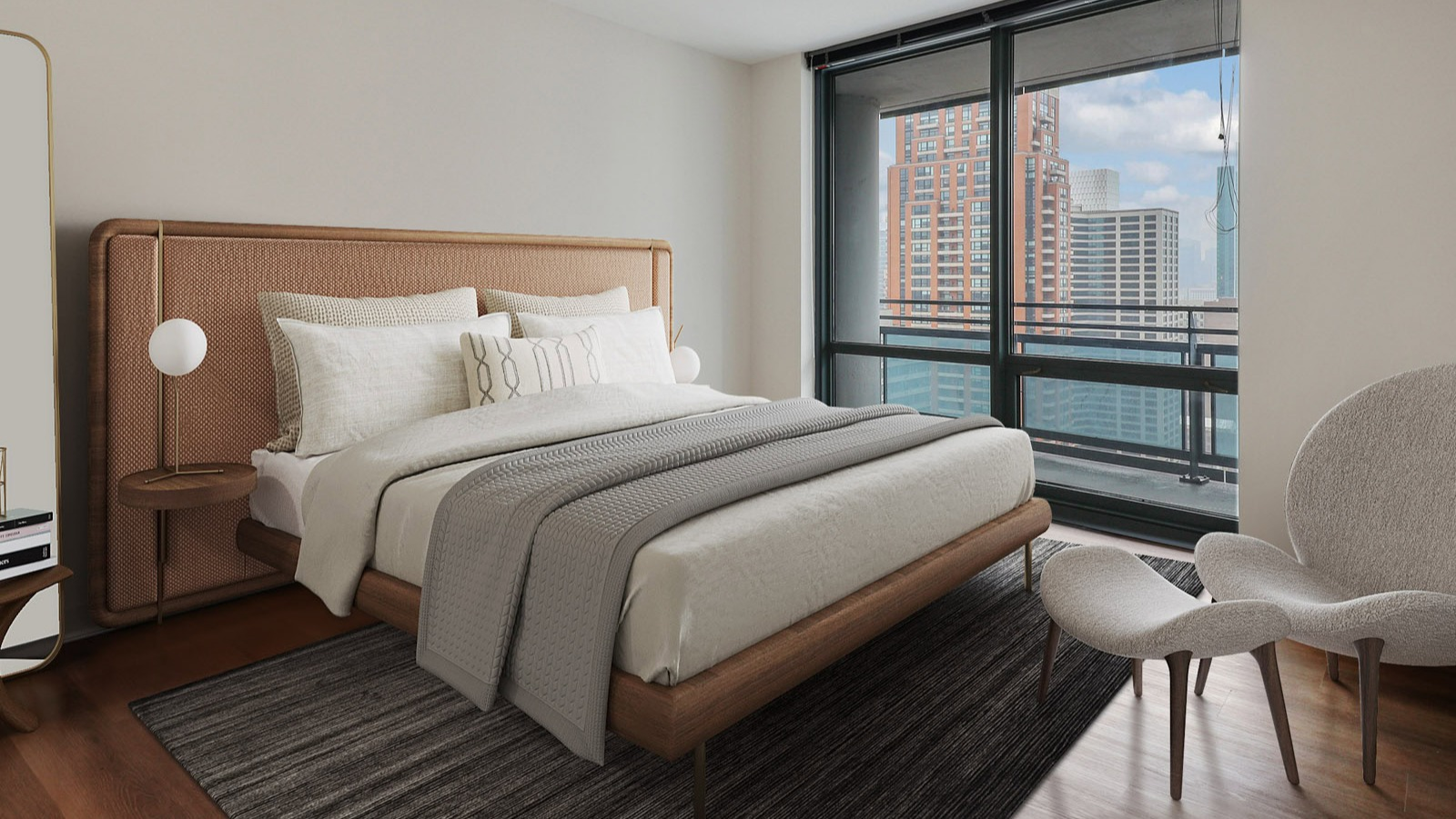 Luxurious bedroom at SKY55 in Chicago, featuring a plush bed, modern nightstands, and expansive windows offering city views
