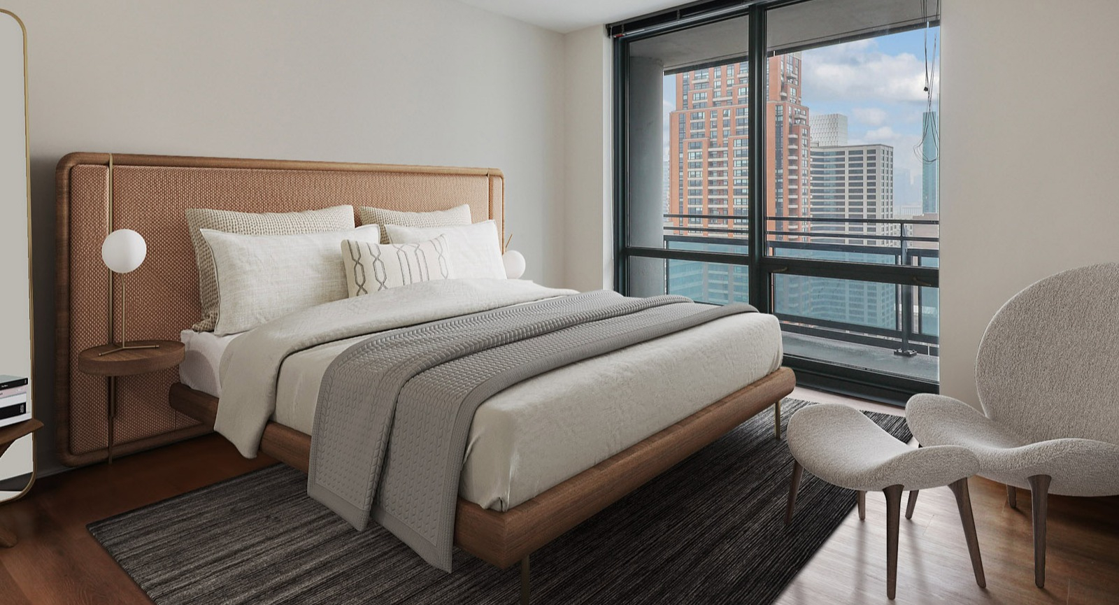 Luxurious bedroom at SKY55 in Chicago, featuring a plush bed, modern nightstands, and expansive windows offering city views