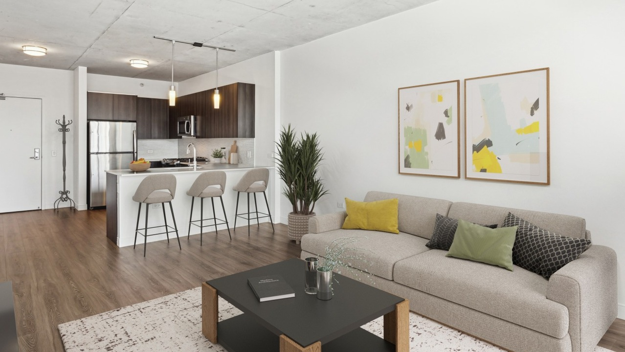 An open-plan kitchen and living space at Spoke Apartments in Chicago, ideal for entertaining and relaxed living