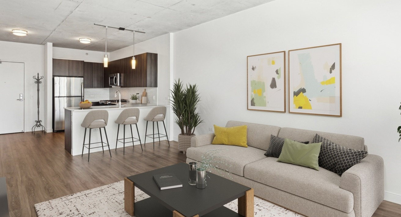 An open-plan kitchen and living space at Spoke Apartments in Chicago, ideal for entertaining and relaxed living