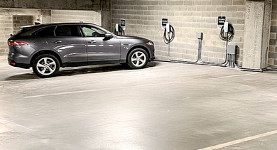 Convenient electric vehicle charging station in the parking garage at State & Chestnut in Chicago, offering reserved EV parking