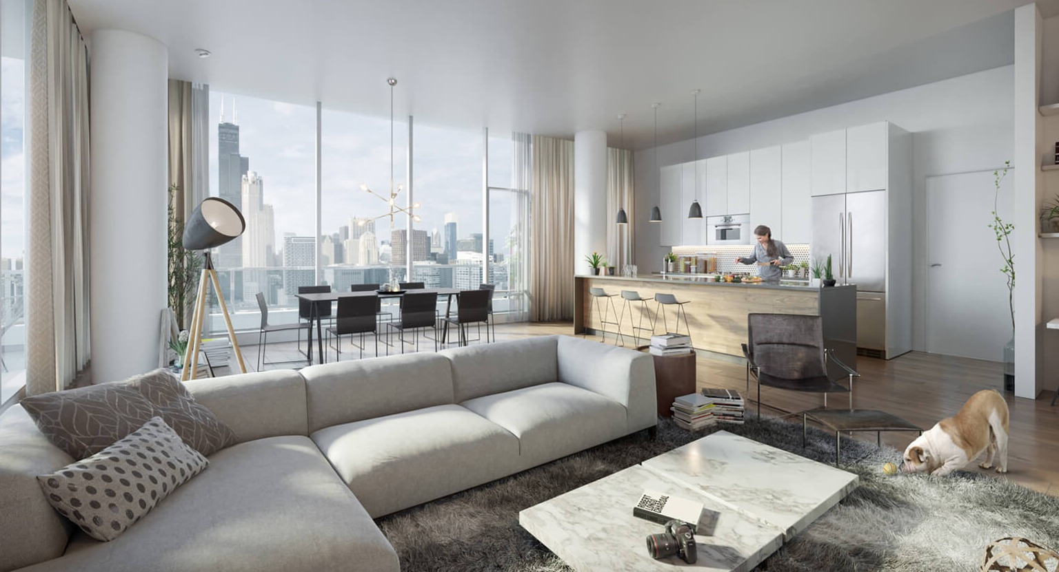 Luxurious penthouse living room with a large sectional sofa, modern kitchen, dining area, and stunning city views at The Cooper in Chicago
