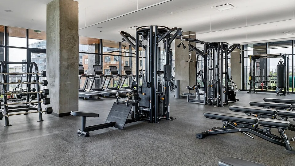State-of-the-art fitness center at The Elizabeth Chicago, featuring a wide range of weight machines and strength training equipment