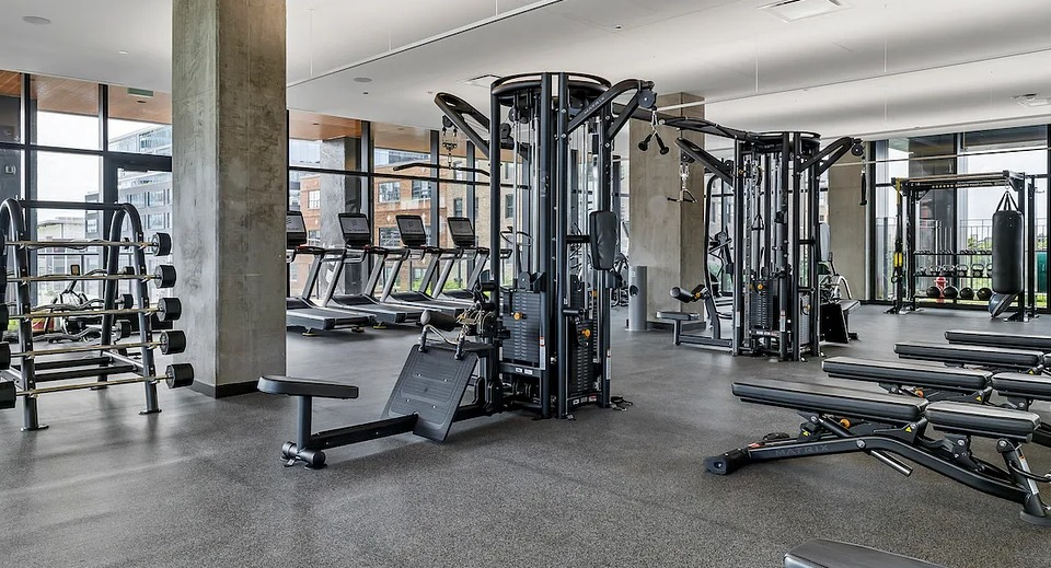 State-of-the-art fitness center at The Elizabeth Chicago, featuring a wide range of weight machines and strength training equipment