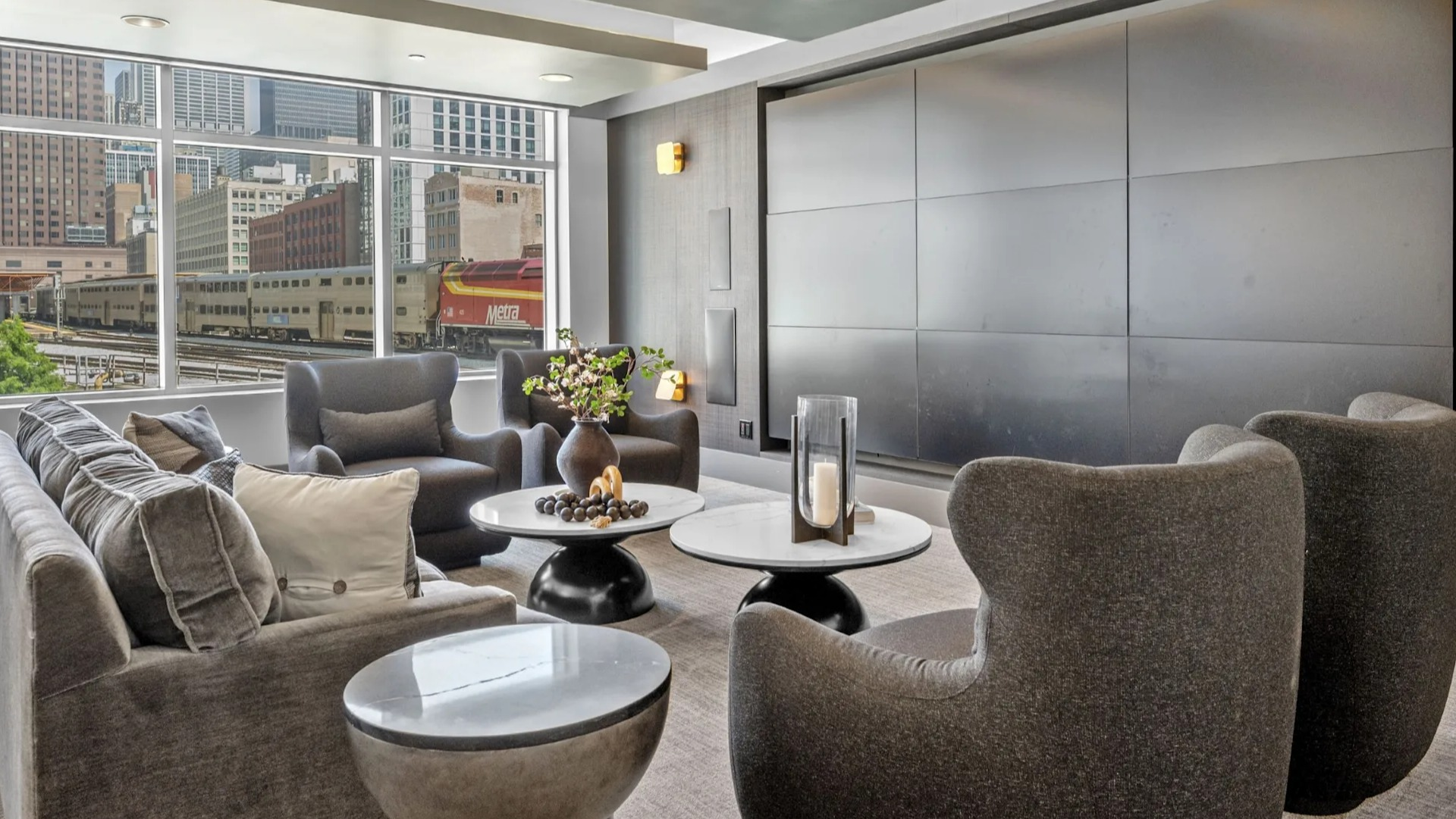 Comfortable media room with plush seating and modern decor at The Elle in Chicago