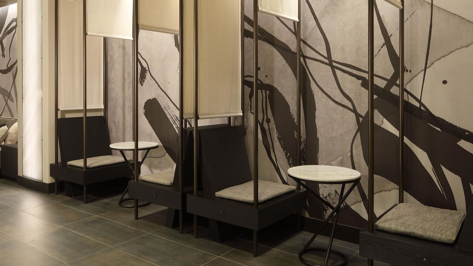 Modern coworking space with individual seating pods and abstract wall art, ideal for remote work at Union West