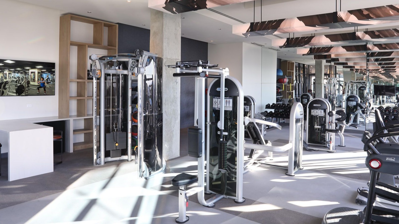 State-of-the-art fitness center with a wide range of exercise machines and ample space at Union West apartments in Chicago