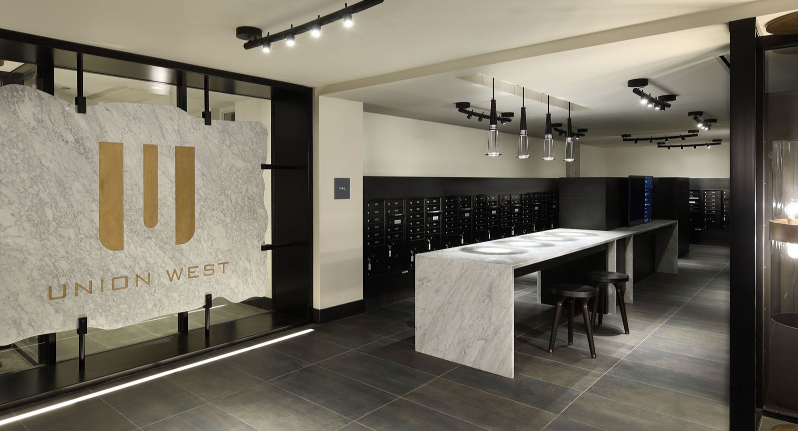 Modern and secure package room with individual lockers and a clean design, ensuring convenient deliveries at Union West, Chicago