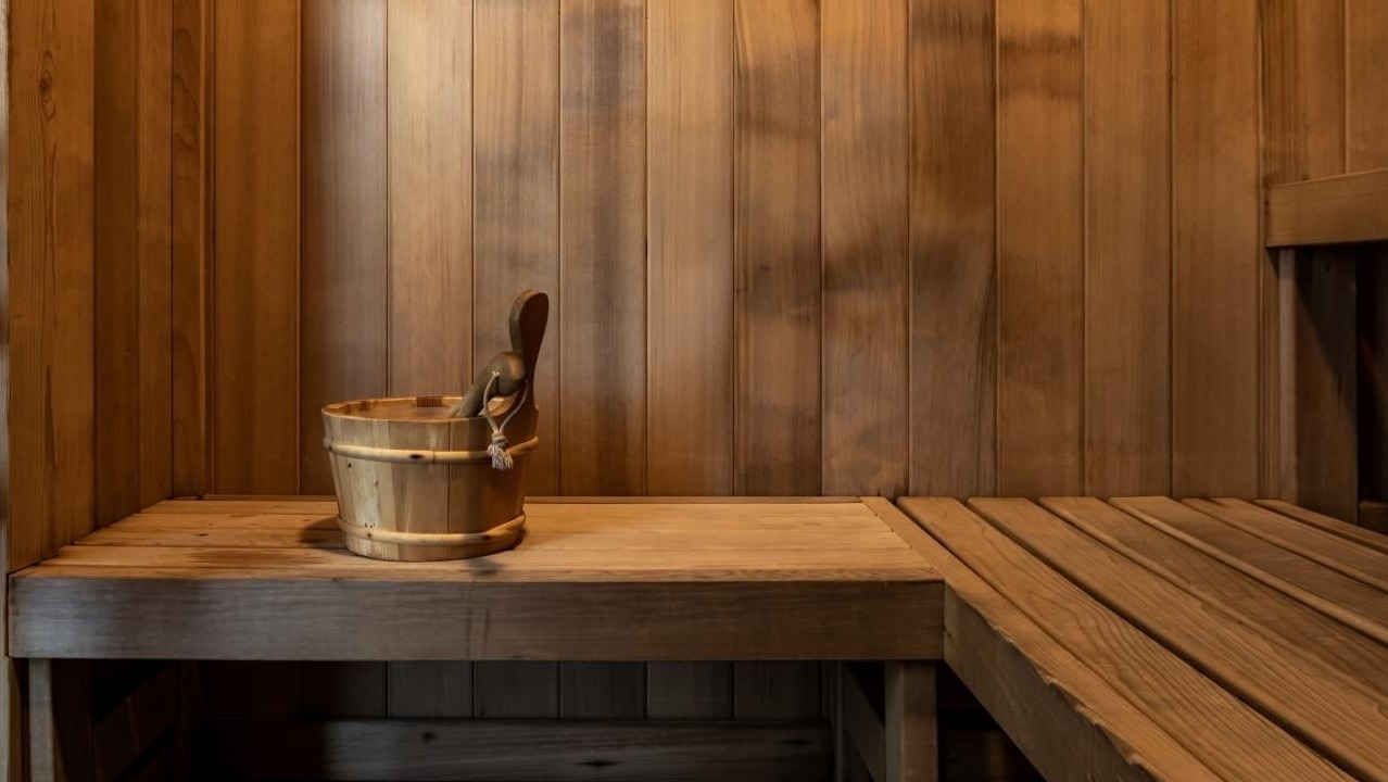 Wooden sauna at Wolf Point West apartments in Chicago offering a relaxing wellness amenity for residents